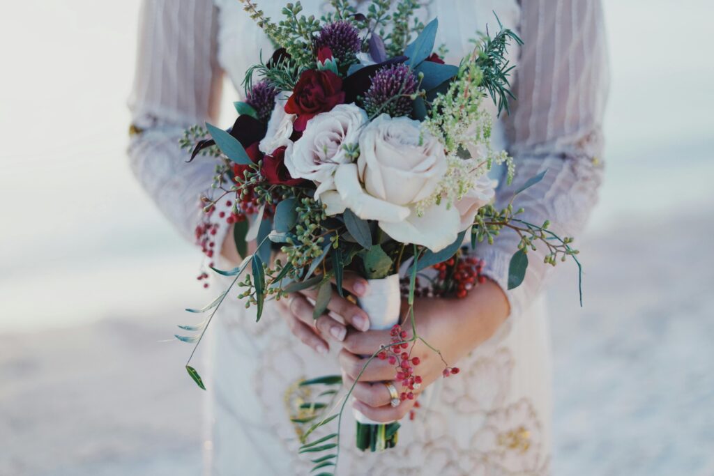 winter wedding dress and bouquet