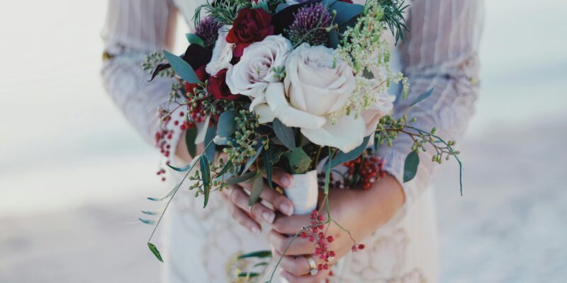 winter wedding dress and bouquet